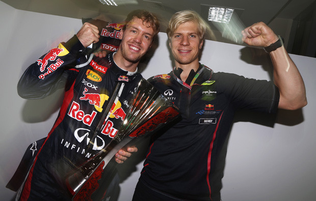 Sebastian Vettel com o seu treinador, Heikki Huovinen.jpg