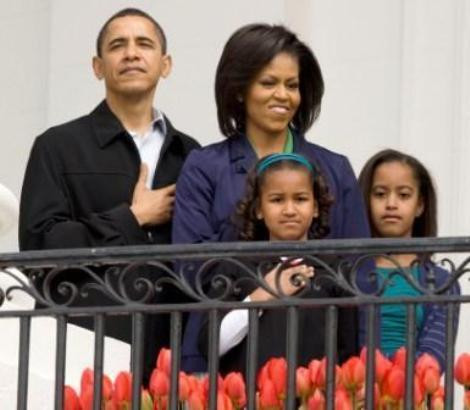 Barack e Michelle Obama com as filhas, Malia e Sasha
