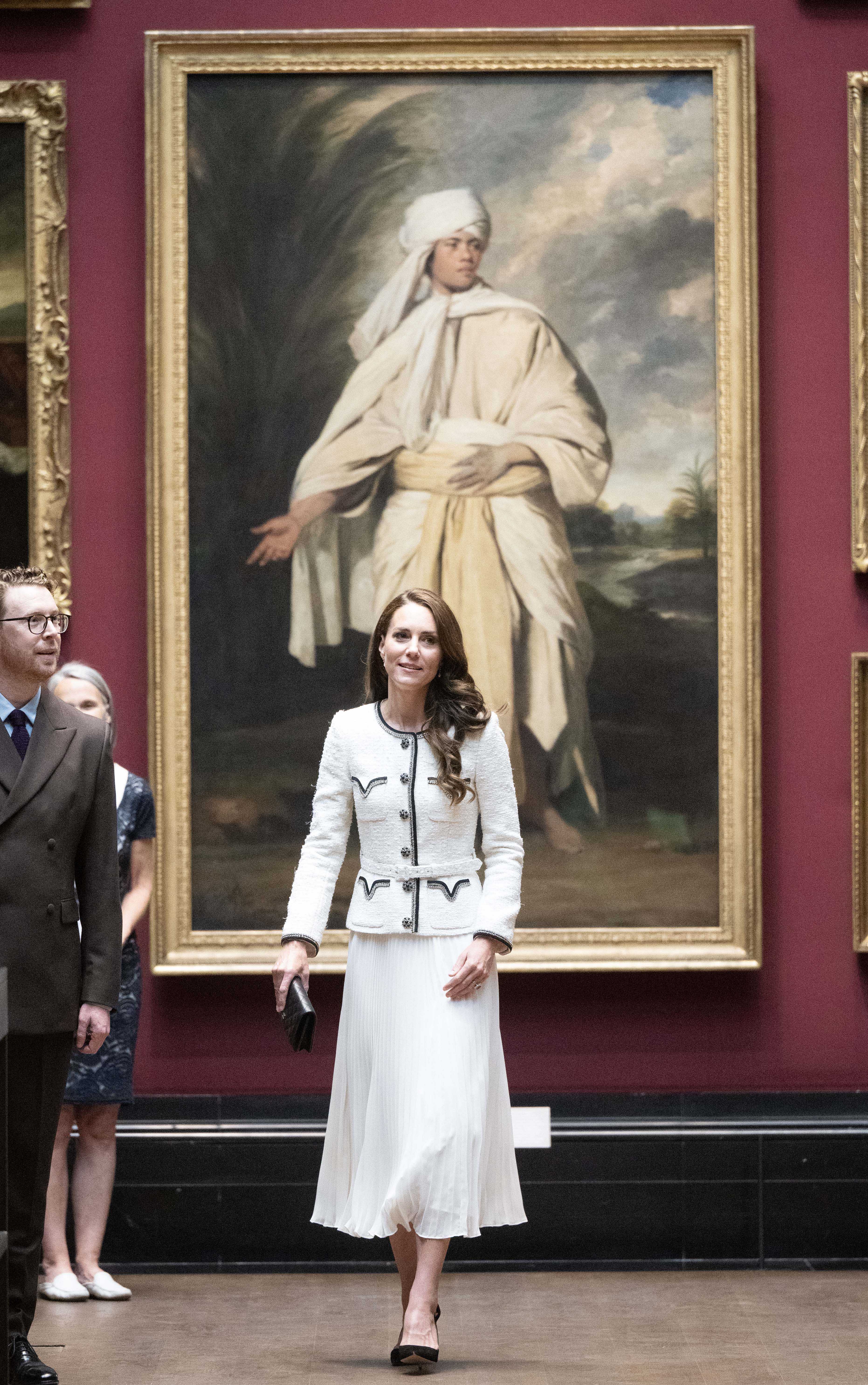 Kate deslumbrante num visual bicolor