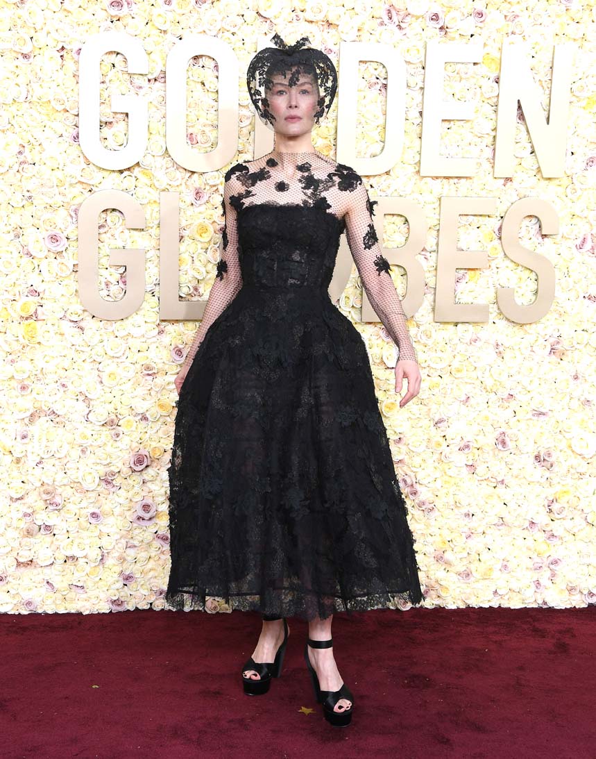Véu de Rosamund Pike cobriu marcas de acidente