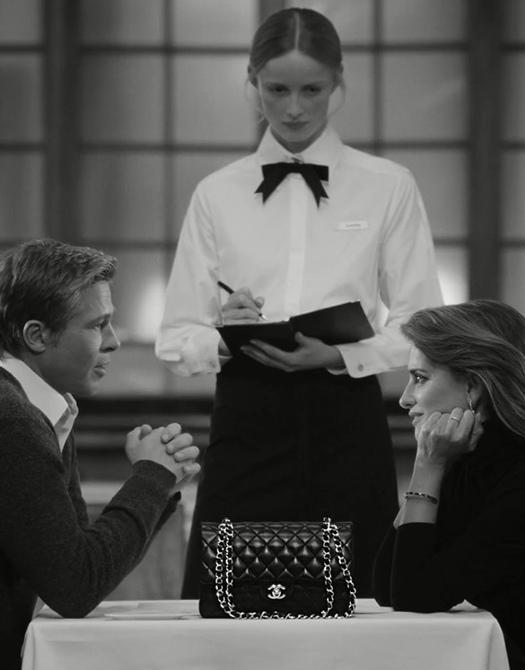 Penélope Cruz e Brad Pitt juntos no desfile da Chanel